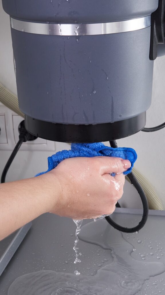 garbage disposal repair vertical